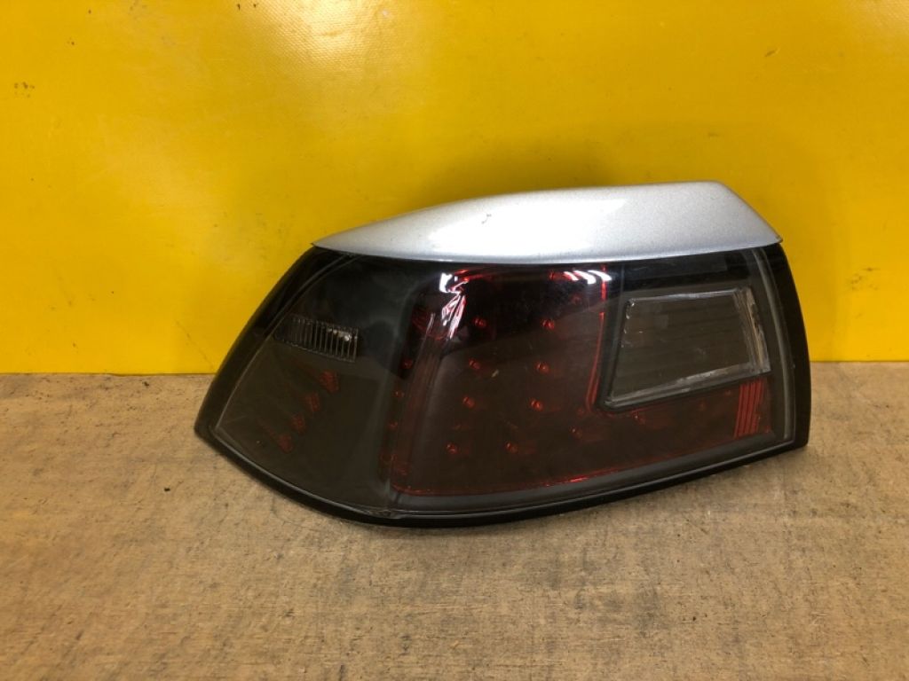 8330A621 | Ліхтар зовнішній лів. MITSUBISHI LANCER X 10 15-17