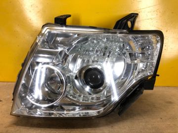 Фара лів. MITSUBISHI PAJERO 06-21