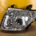 8301C809 | Фара лев. MITSUBISHI PAJERO 06-21