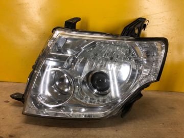 Фара лев. MITSUBISHI PAJERO 06-21