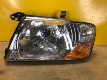 Фара лів. MITSUBISHI PAJERO 99-06