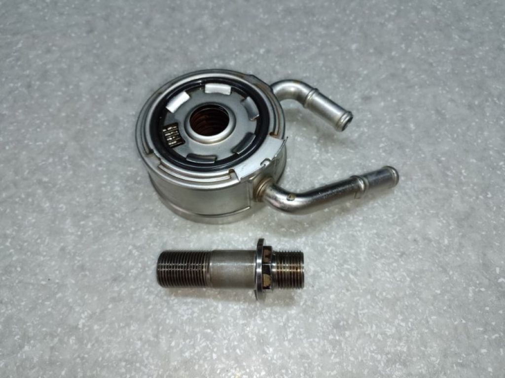 21305-JD02C | Теплообмінник масляного фільтру. NISSAN NV200 USA 13-