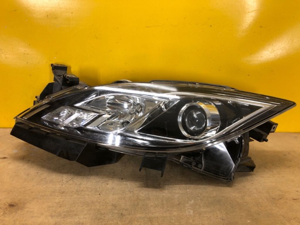 GS1F510L0G | Фара лів. MAZDA 6 GH 07-12