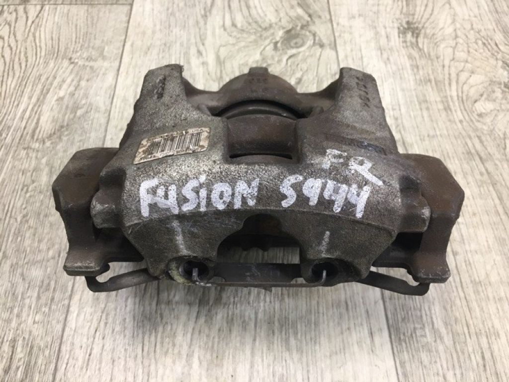 DG9Z-2B120-A | Суппорт тормозной передн. прав. FORD FUSION 14-
