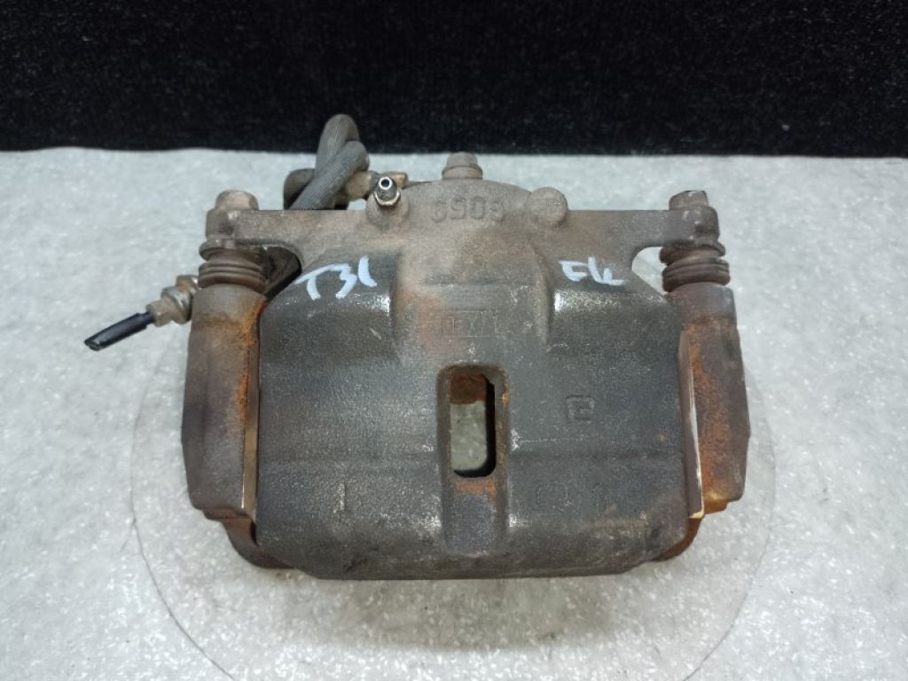 41011-JE00A | Суппорт тормозной передн. лев. NISSAN X-TRAIL T31 07-14