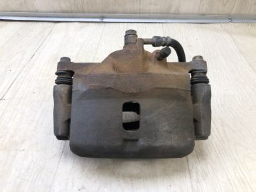 Суппорт тормозной передн. лев. HONDA CIVIC 4D 06-11