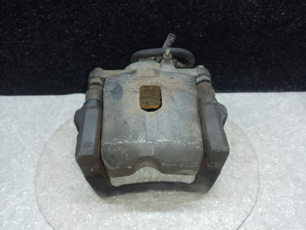 47750-42040 | Суппорт тормозной передн. лев. TOYOTA RAV4 00-05