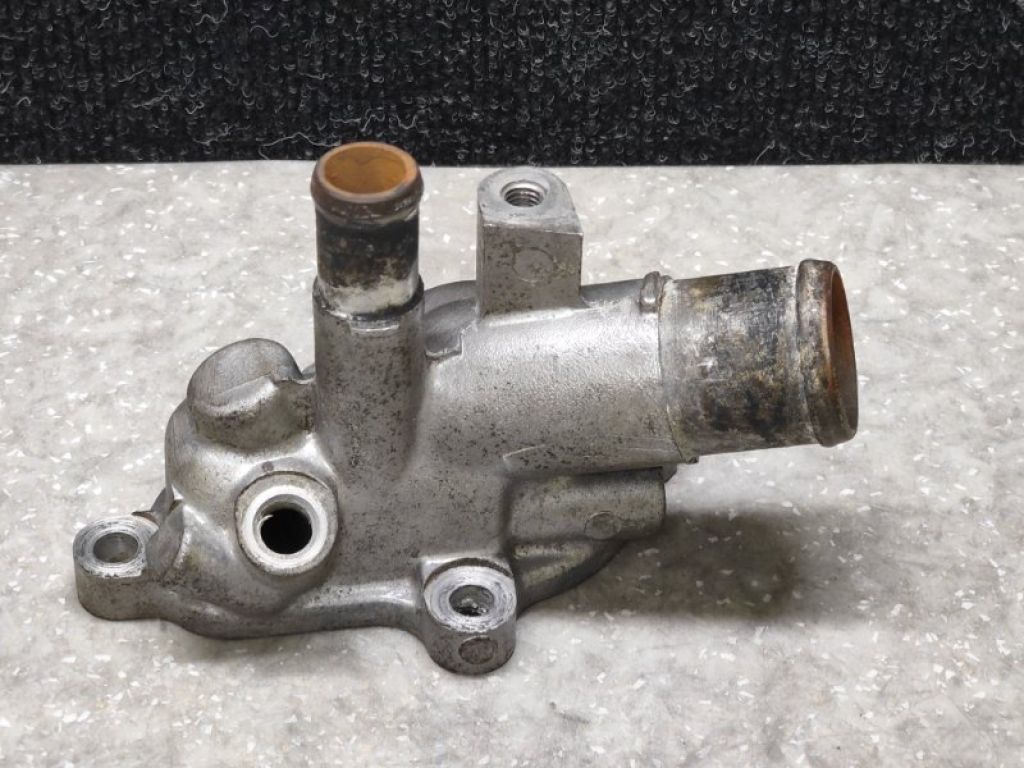 11060-8H700 | Корпус термостата NISSAN X-TRAIL T30 01-07