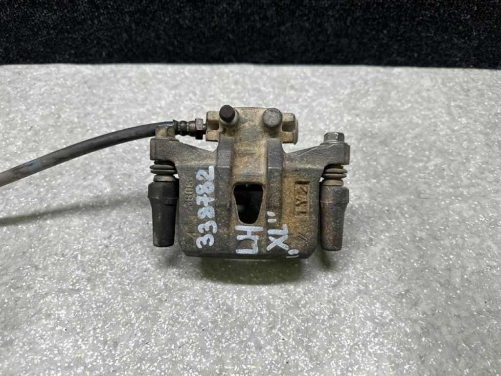 MN116309 | Суппорт тормозной задн. лев. MITSUBISHI OUTLANDER XL 05-13