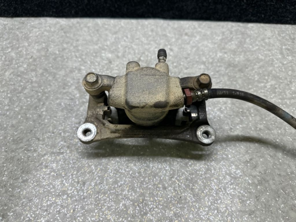 MN116309 | Суппорт тормозной задн. лев. MITSUBISHI OUTLANDER XL 05-13 - Фото 3