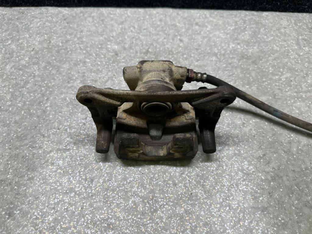 MN116309 | Суппорт тормозной задн. лев. MITSUBISHI OUTLANDER XL 05-13 - Фото 4