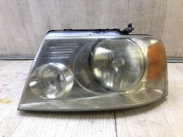 Фара ліва FORD F-150 2004–08