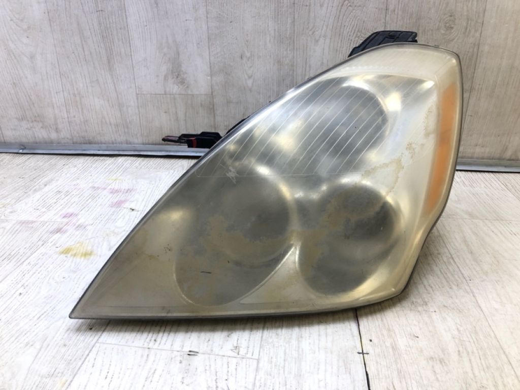 921014J000 | Фара лів. HYUNDAI ENTOURAGE 06-09