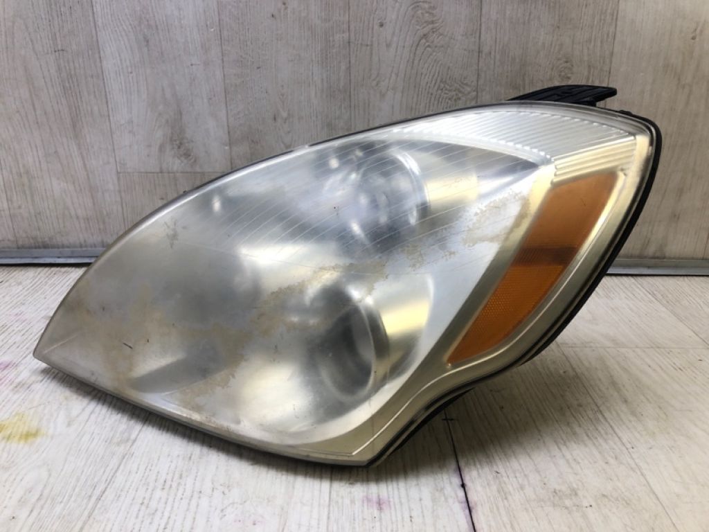 921014J000 | Фара лів. HYUNDAI ENTOURAGE 06-09 - Фото 2