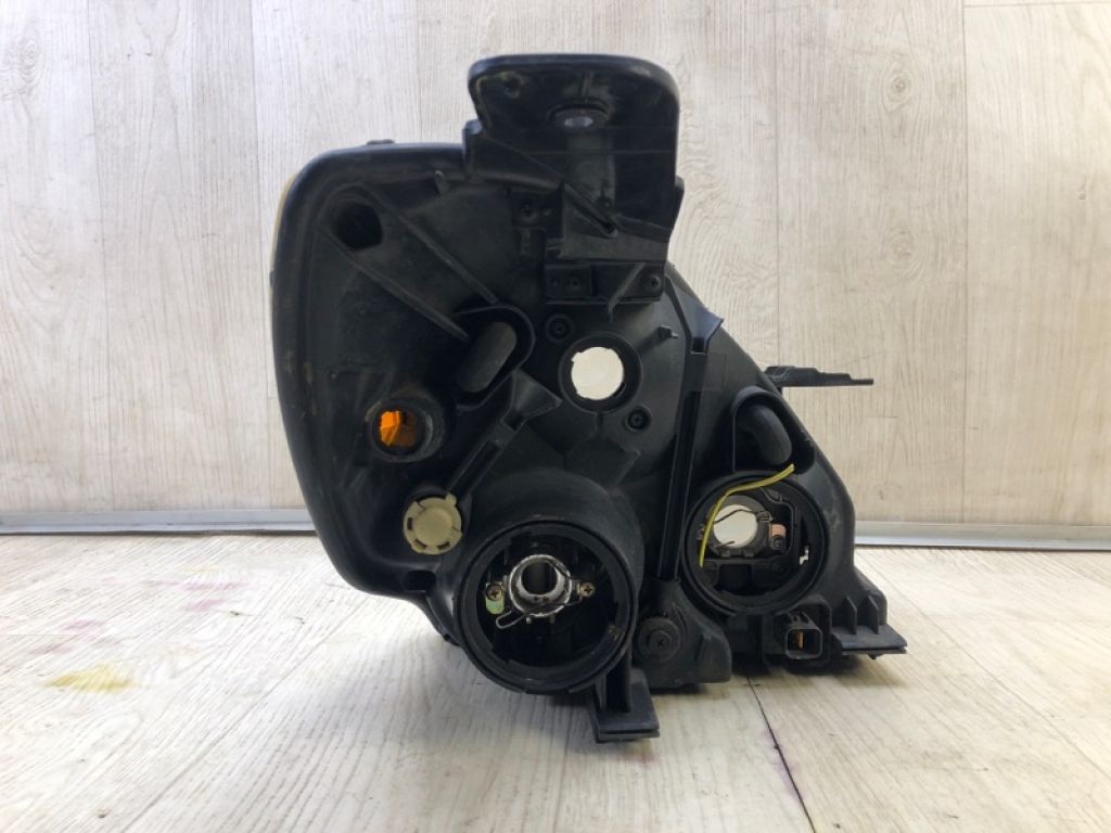 921014J000 | Фара лів. HYUNDAI ENTOURAGE 06-09 - Фото 4