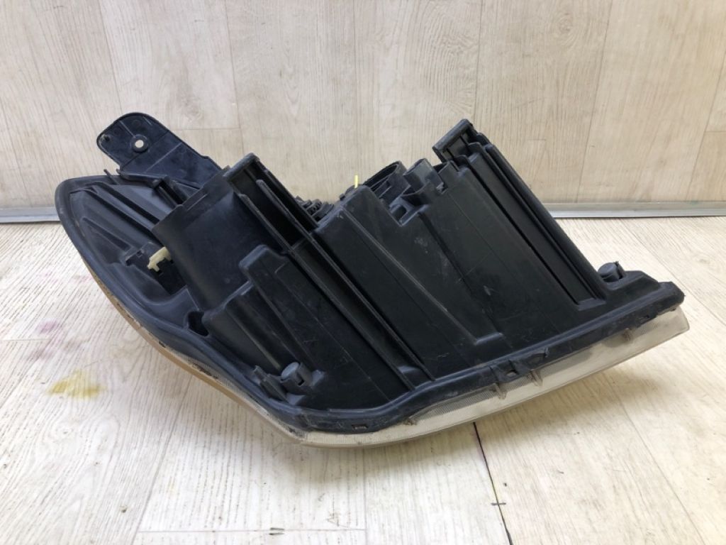 921014J000 | Фара лів. HYUNDAI ENTOURAGE 06-09 - Фото 7