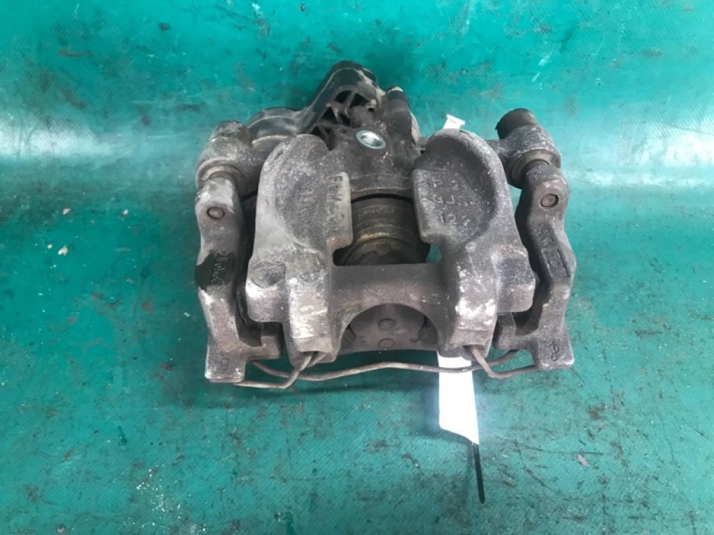 DG9Z-2552-C | Суппорт тормозной задн. прав. FORD FUSION 14-