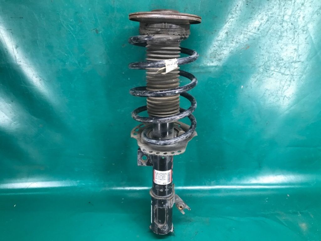 HG9Z-18124-F | Амортизатор передн. лев. FORD FUSION 14-