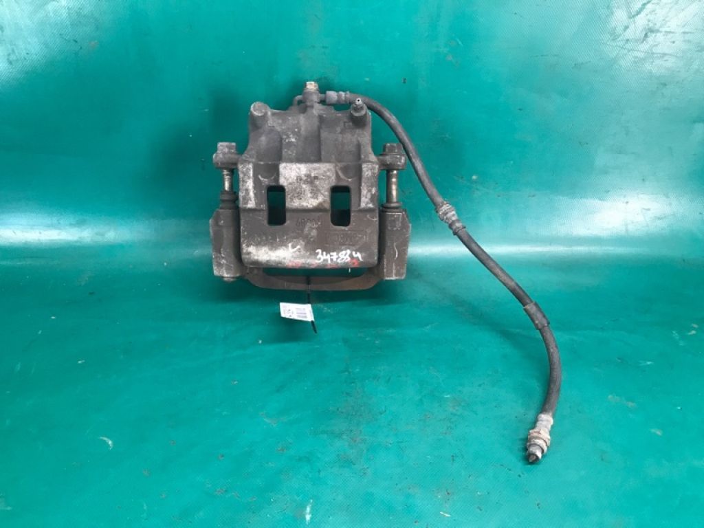 L2Z2-33-99Z | Суппорт тормозной передн. лев. MAZDA CX-9 06-16