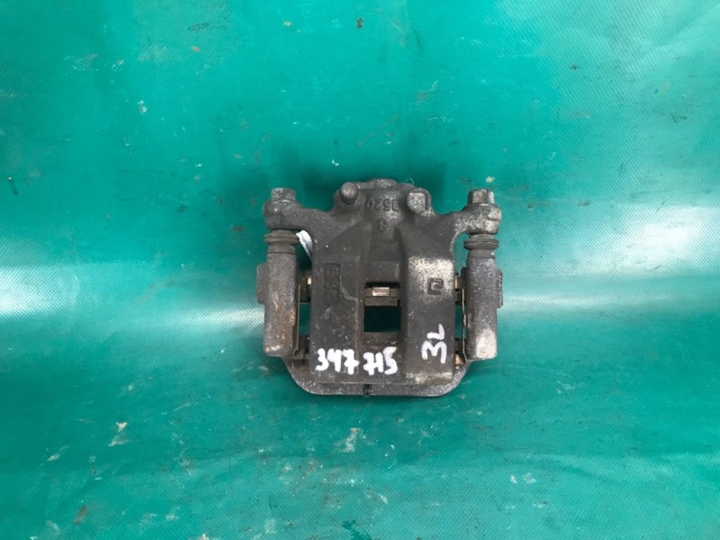 44011JG00A | Суппорт тормозной задн. лев. NISSAN ROGUE 08-15