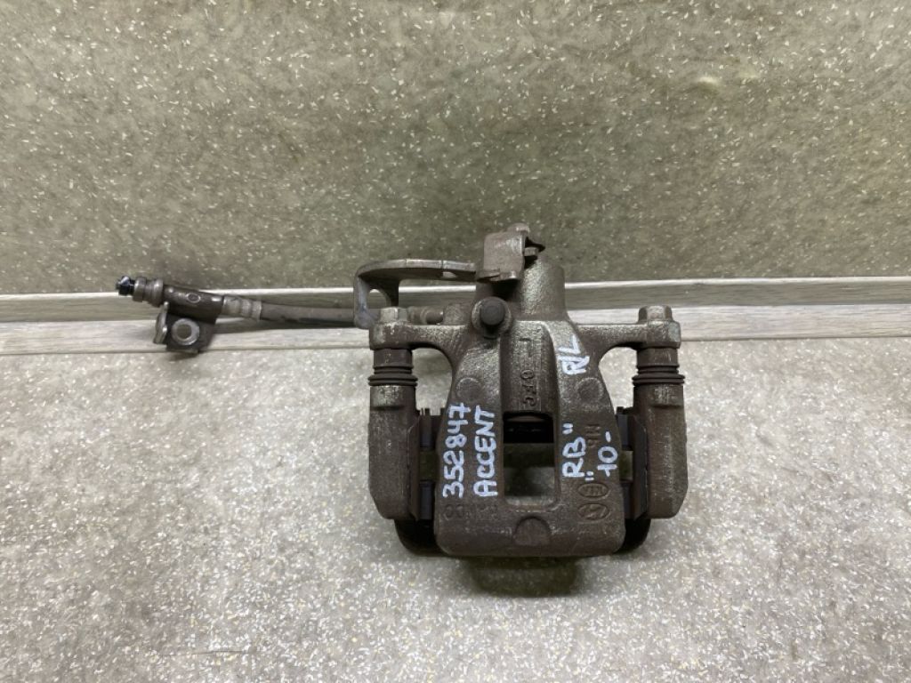 58300-1R300 | Супорт гальмівний задн. лів. HYUNDAI ACCENT RB 10-