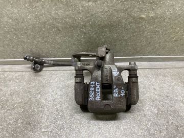 Супорт гальмівний задн. лів. HYUNDAI ACCENT RB 10-