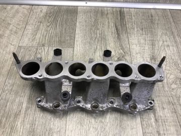 Колектор впускний MITSUBISHI OUTLANDER XL 05-13