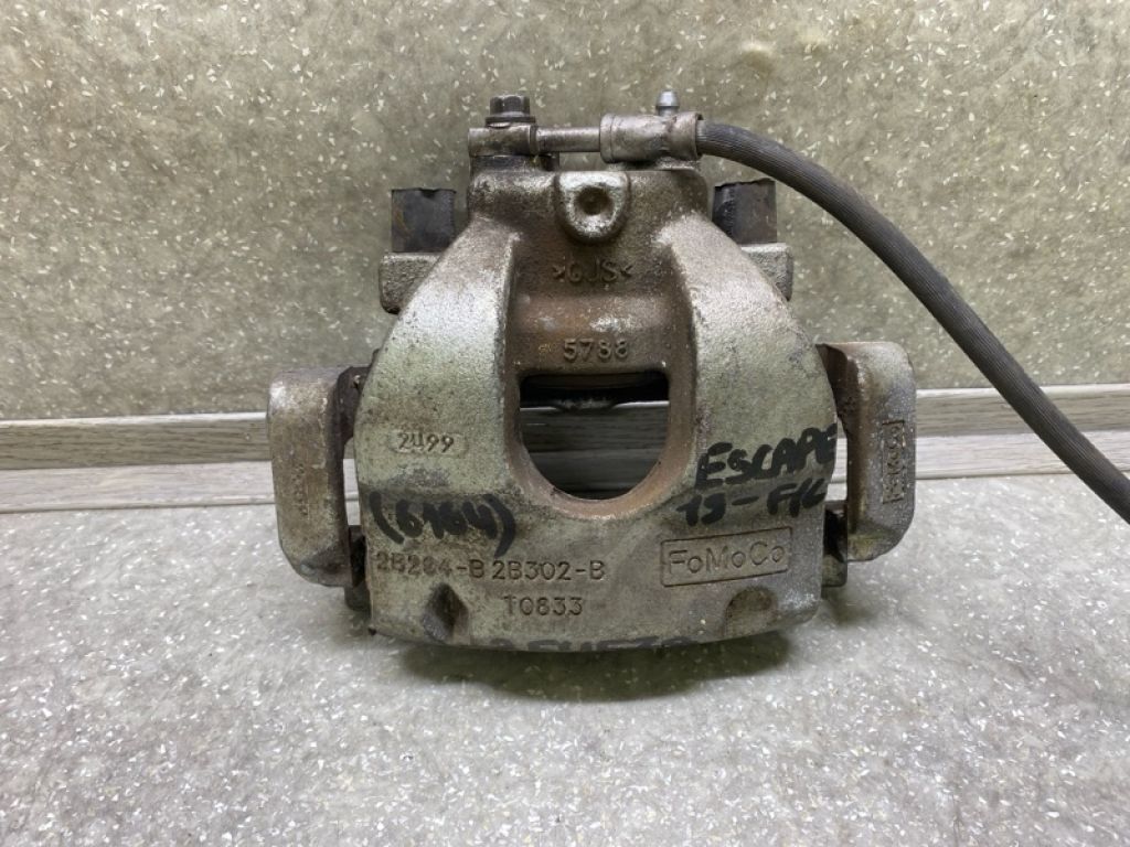 JX6Z-2B121-K | Супорт гальмівний передн. лів. FORD ESCAPE 19 -