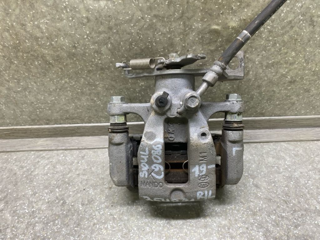 58210-K0100 | Супорт гальмівний задн. лів. KIA SOUL SK3 19-