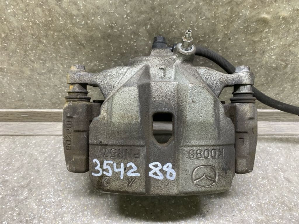 GHY9-33-99Z | Супорт гальмівний передн. лів. MAZDA 6 GJ 12-