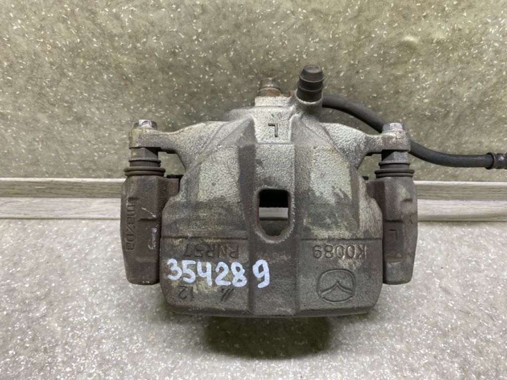 GHY9-33-99Z | Суппорт тормозной передн. лев. MAZDA 6 GJ 12-