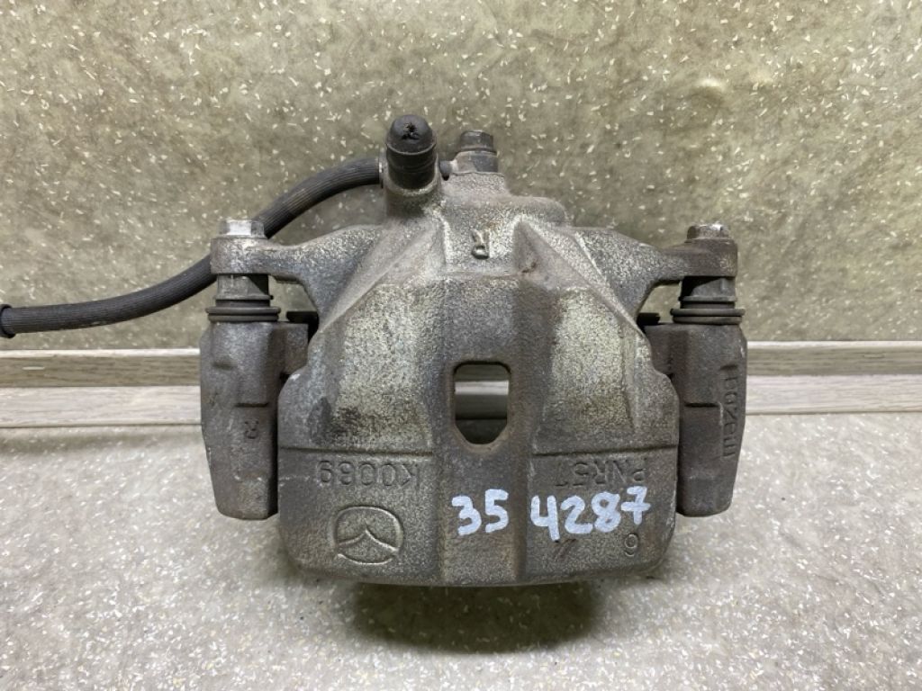 GHY9-33-98Z | Супорт гальмівний передн. прав. MAZDA 6 GJ 12-