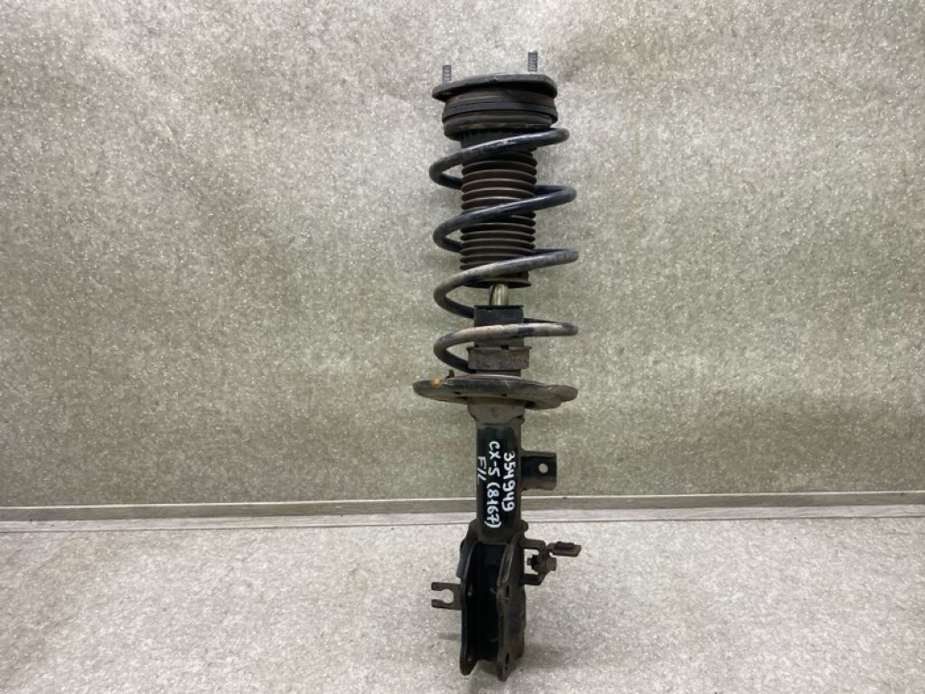 KB7W-34-900B | Амортизатор передн. лев. MAZDA CX-5 (KF) 16-21