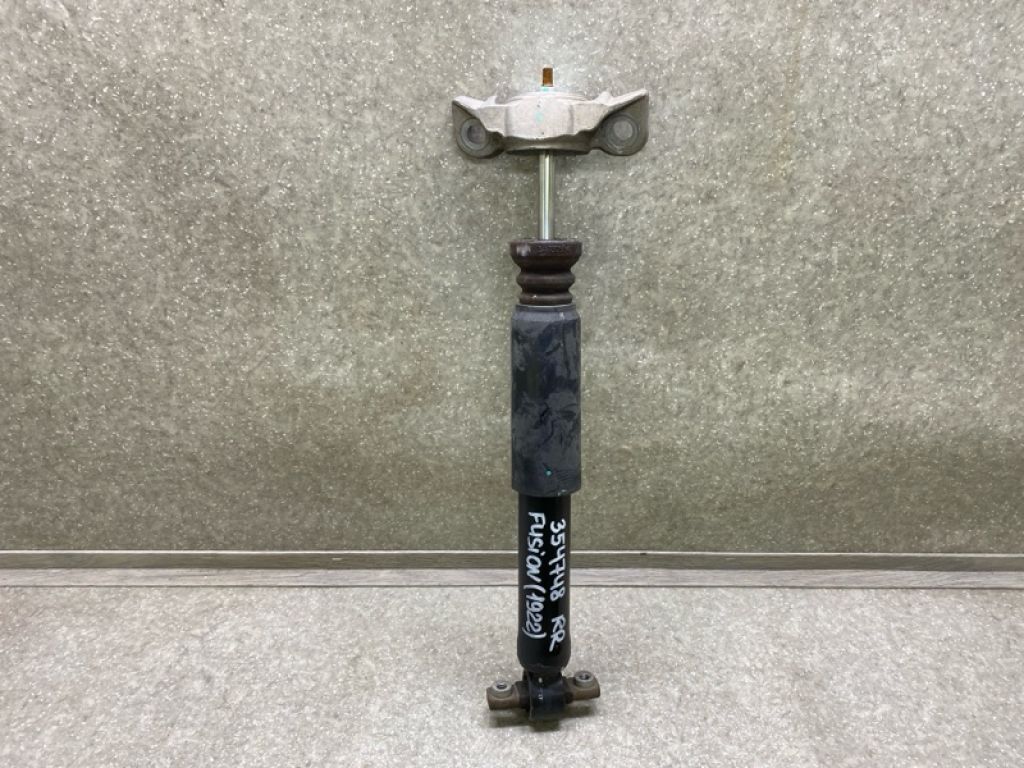 HG9Z-18125-J | Амортизатор задн. FORD FUSION 14-