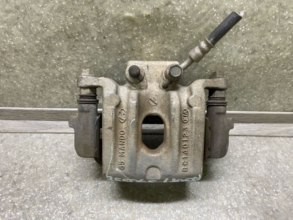 58210-4Z700 | Супорт гальмівний задн. лів. HYUNDAI SANTA FE (DM) 12-18