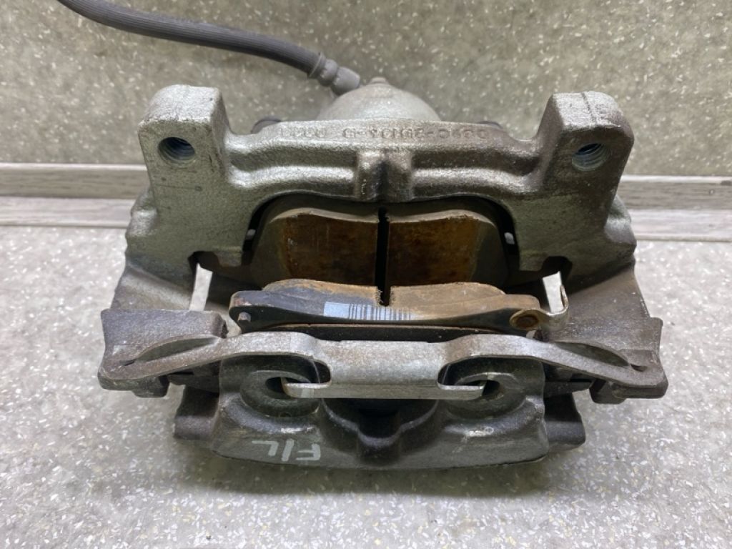 DG9Z-2B121-A | Супорт гальмівний передн. лів. FORD FUSION 14- - Фото 4