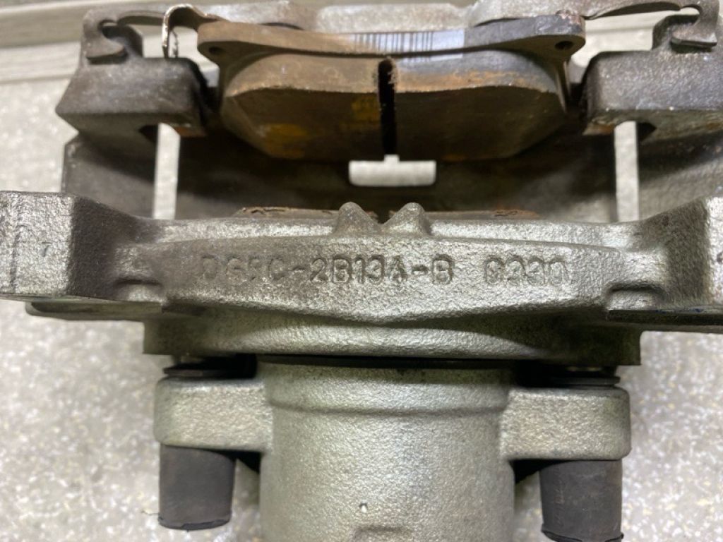 DG9Z-2B121-A | Супорт гальмівний передн. лів. FORD FUSION 14- - Фото 6