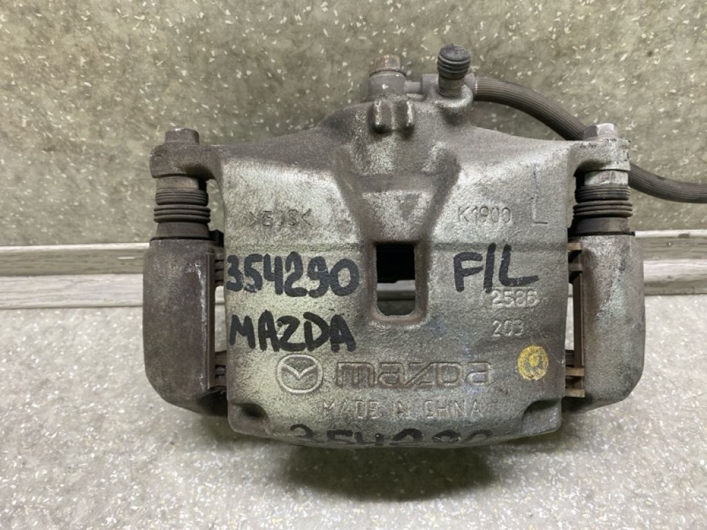 B4Y0-33-99ZC | Супорт гальмівний передн. лів. MAZDA 3 BM 13-19