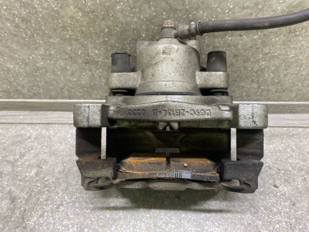 DG9Z-2B120-A | Супорт гальмівний передн. прав. FORD FUSION 14- - Фото 3