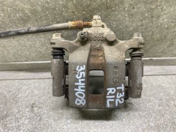 Супорт гальмівний задн. лів. NISSAN X-TRAIL/ROGUE T32 13-20