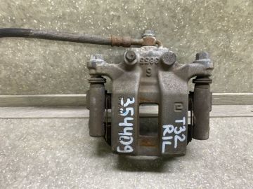 Супорт гальмівний задн. лів. NISSAN X-TRAIL/ROGUE T32 13-20