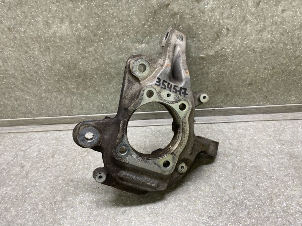 DE9Z-3K186-A | Кулак поворотний лів. FORD FLEX 08-19