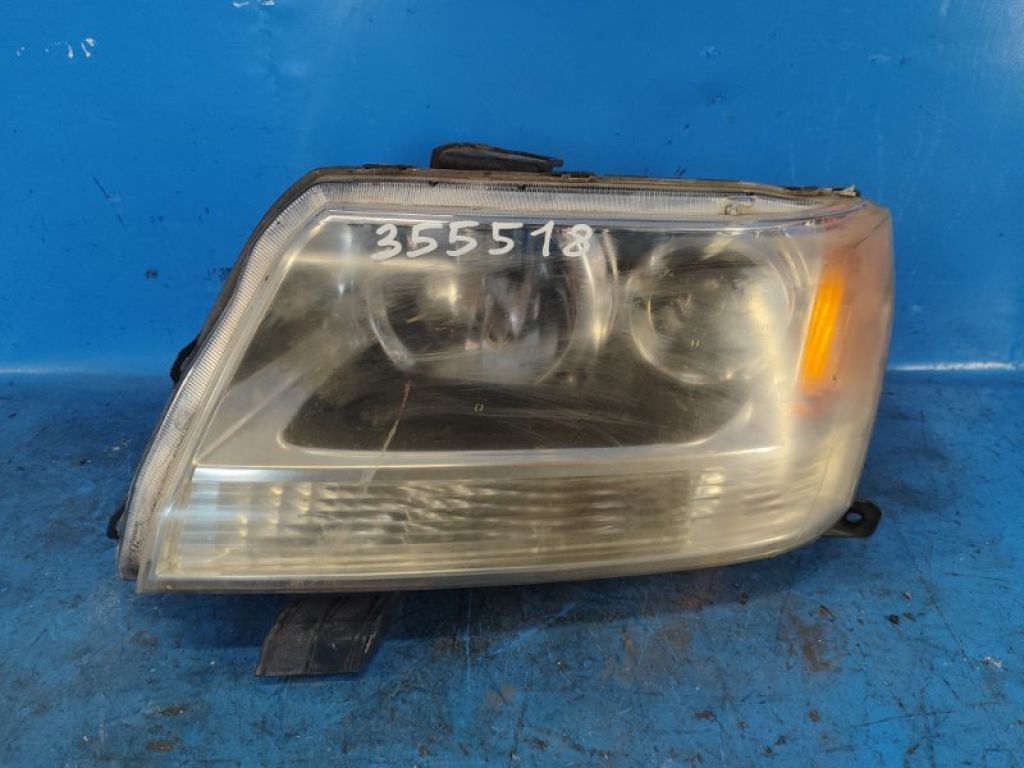 35320-65J01 | Фара лів. SUZUKI GRAND VITARA 05-15