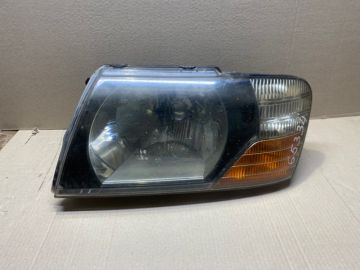 Фара передн. лів. MITSUBISHI PAJERO 99-06