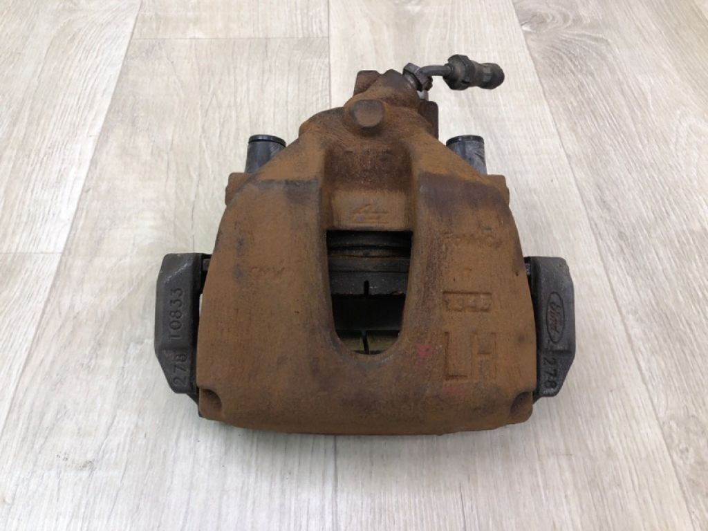 CV6Z-2B121-A | Суппорт тормозной передн. лев. FORD FOCUS 10-18