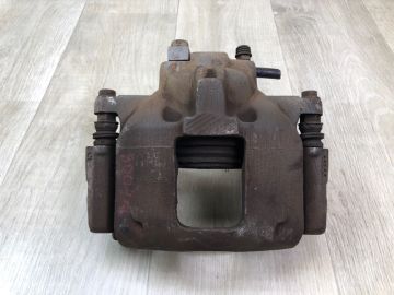 Супорт гальмівний передн. лів. DODGE JOURNEY 08-20