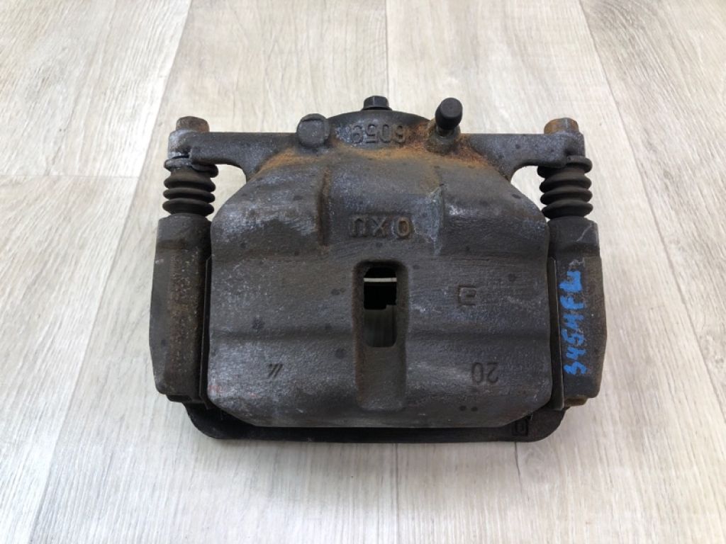 41011-JE00A | Супорт гальмівний передн. лів. NISSAN ROGUE 08-15