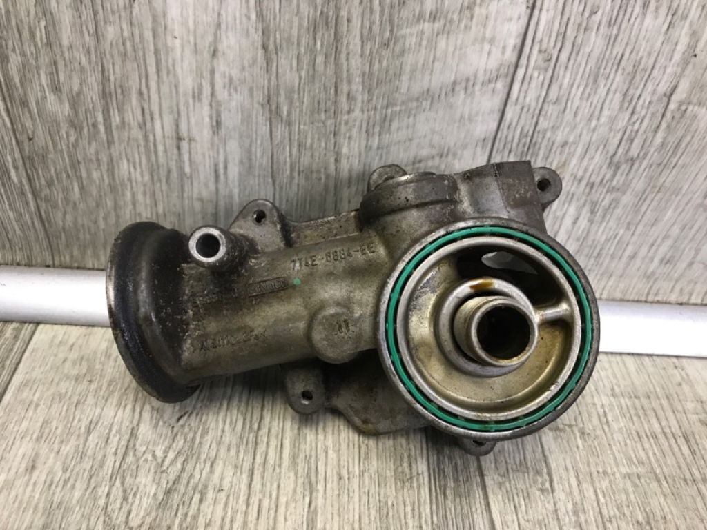 CA02-14-310 | Кронштейн масляного фільтра MAZDA CX-9 06-16