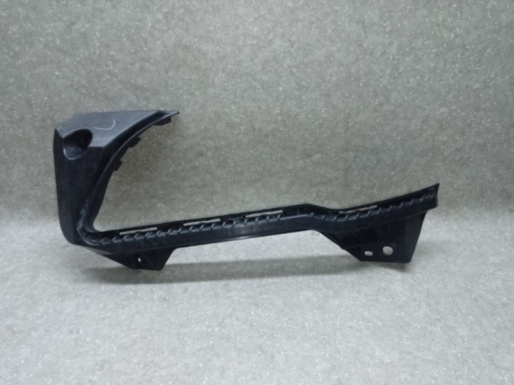 57707AL01A | Кронштейн переднего бампера (под фарой) лев. SUBARU LEGACY BN 14-18