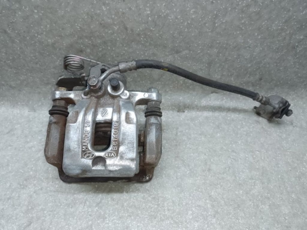 58230-3X300 | Супорт гальмівний задн. прав. HYUNDAI ELANTRA MD 10-15